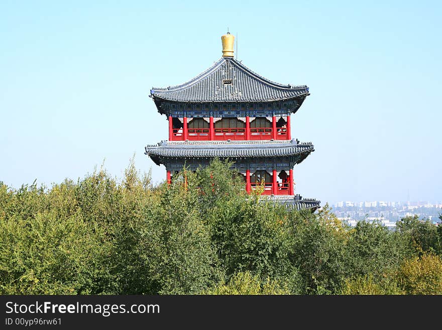 Pagoda tower in trees in china town