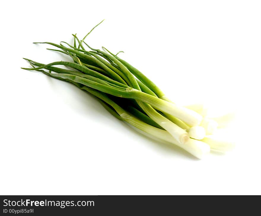 Fresh green onion isolated over white