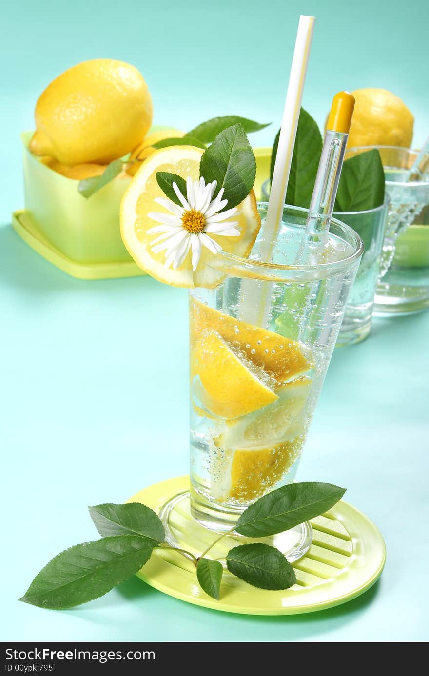 Closeup of glass of iced cold soda with lemon. Closeup of glass of iced cold soda with lemon