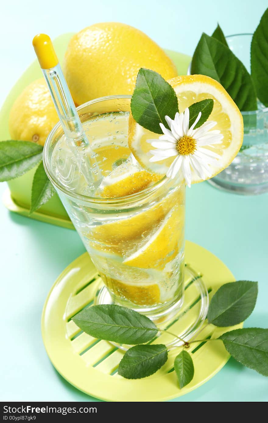 Closeup of glass of iced cold soda with lemon. Closeup of glass of iced cold soda with lemon