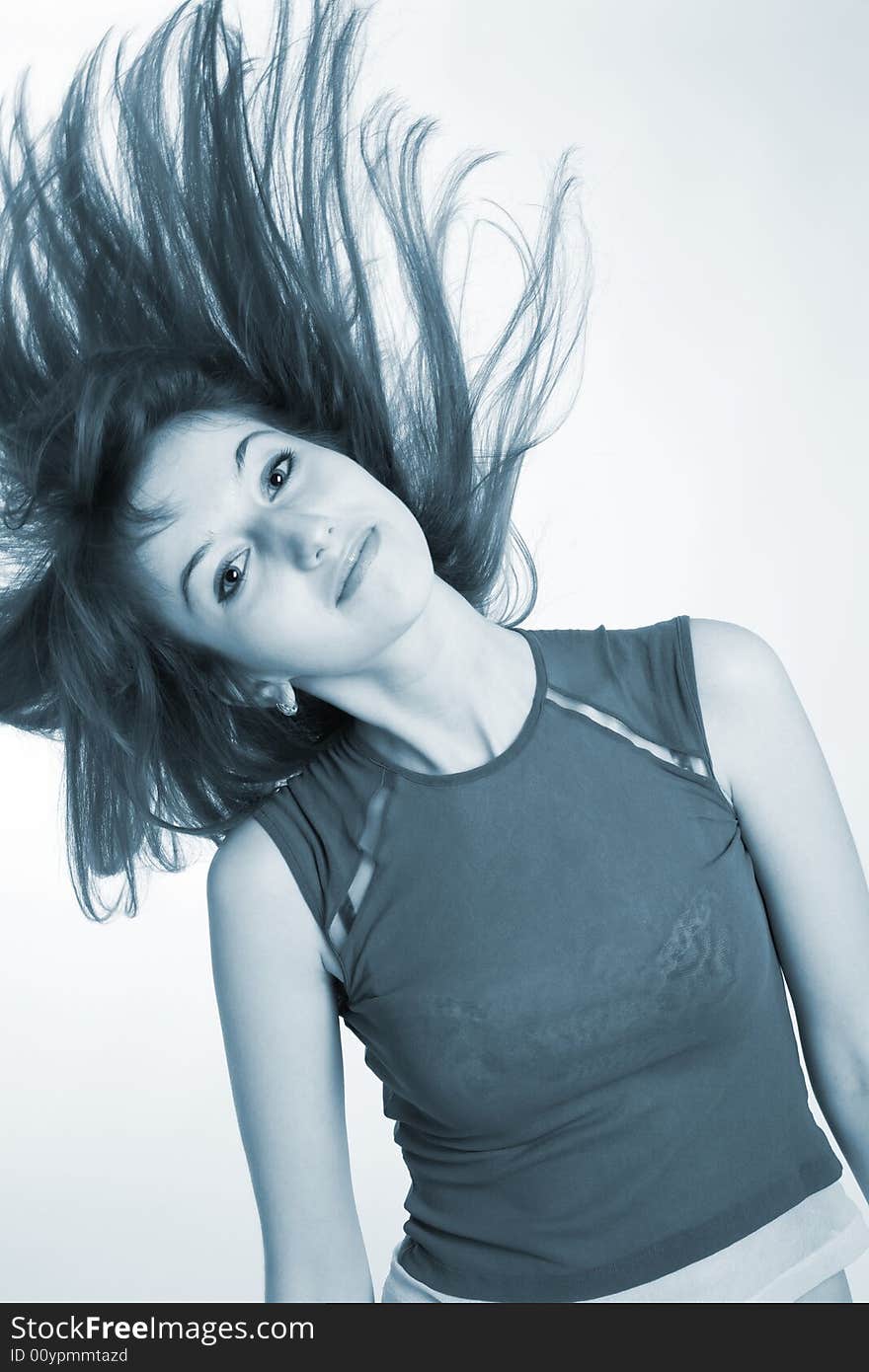 Beautiful girl shaking her hair, monochrome, isolated on white background