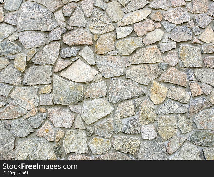 A rough wall made of big stones. A rough wall made of big stones