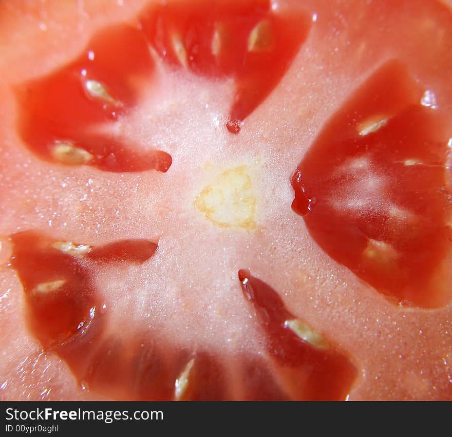 A close up view of slices of roma tomatoes