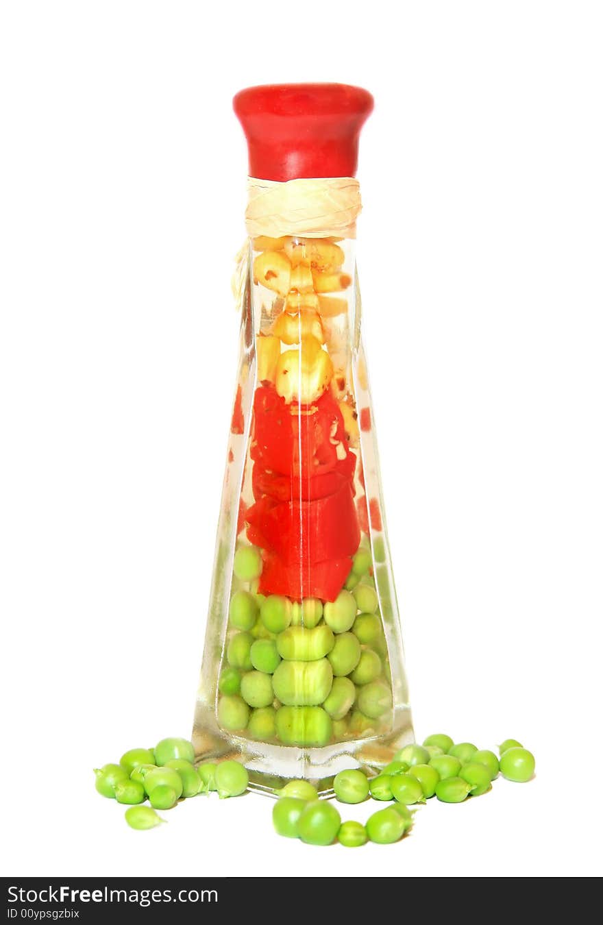 Set - corn, pepper and peas in glass bank on a white background