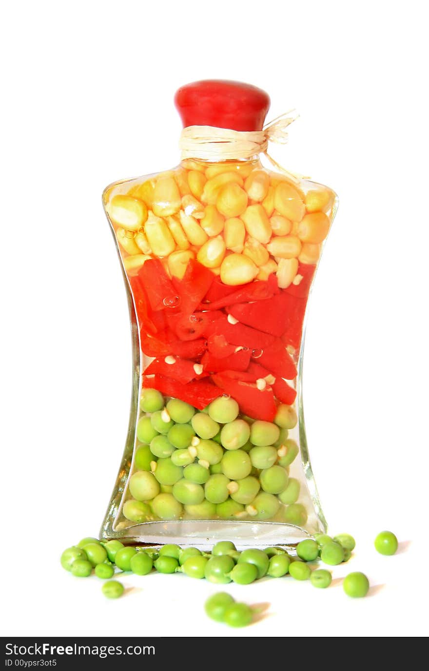 Set-corn, pepper and peas in glass bank on a white background