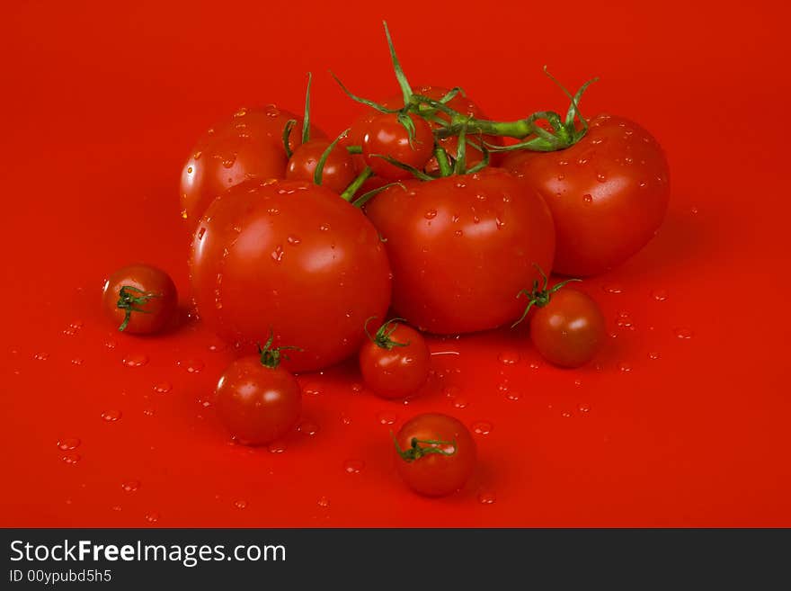 Tomatoes on red