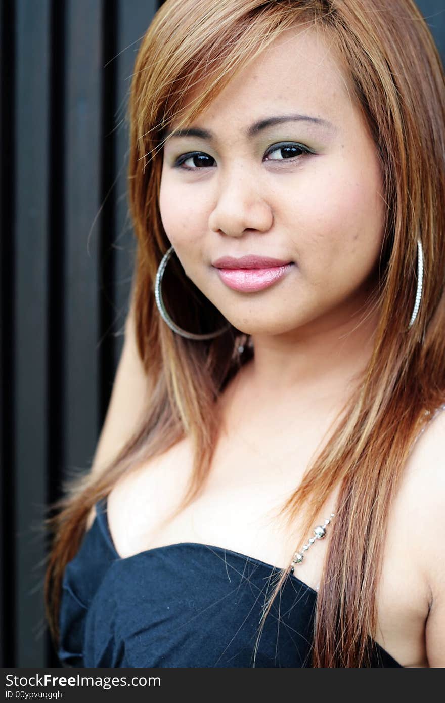 Portrait of a beautiful young Thai woman. Portrait of a beautiful young Thai woman.