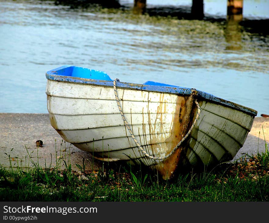 An original shot of a boat resting on a bank. An original shot of a boat resting on a bank