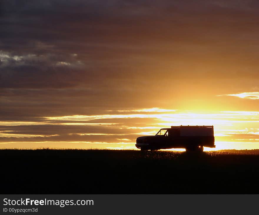 Old vehicle at sunset