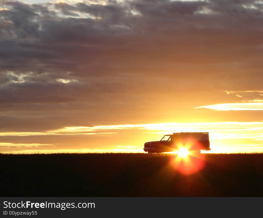 Old vehicle at sunset