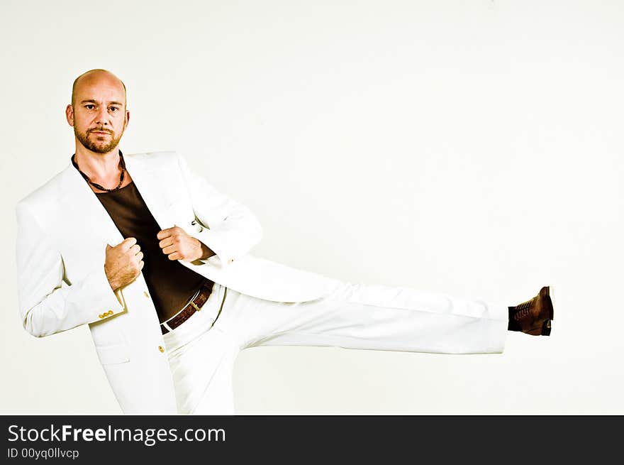 A male model, photographed in the studio.