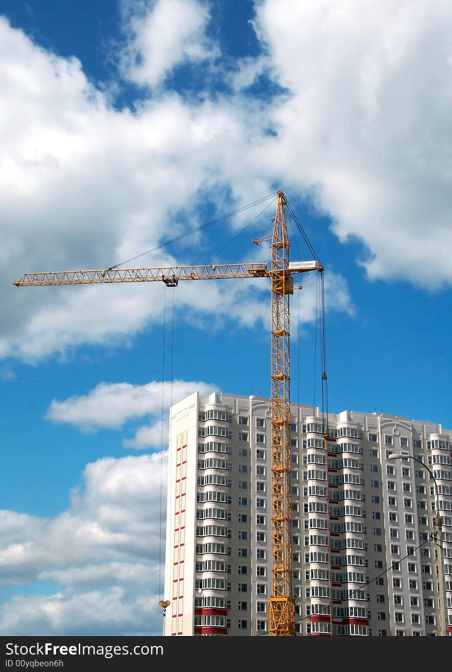 New residential building on sky background