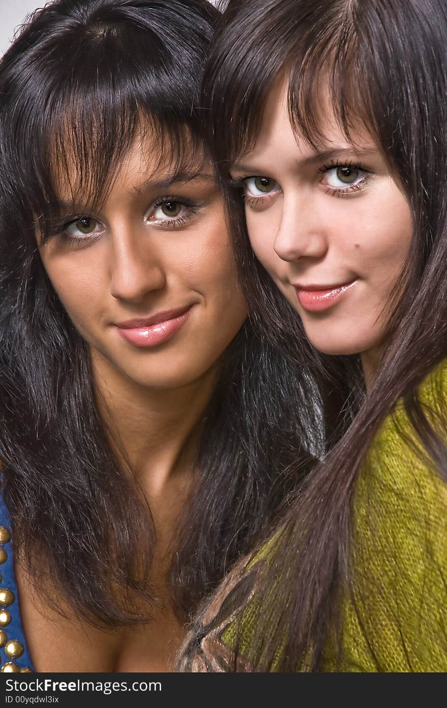 Two  brunettes close up