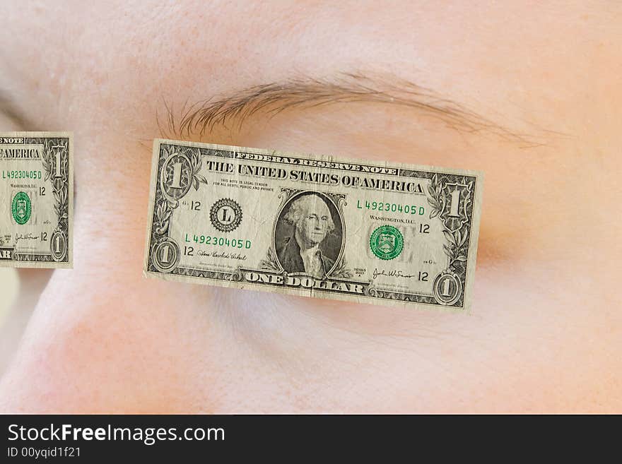 Closeup of eyes with dollar bills blinding the view. Closeup of eyes with dollar bills blinding the view