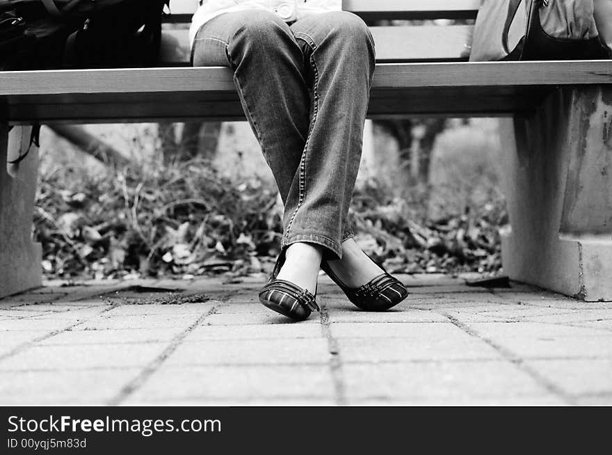 Girl sitting on the bench. Girl sitting on the bench