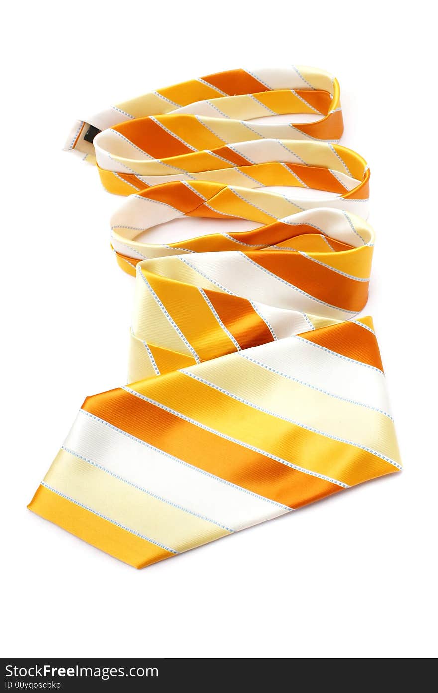 An orange necktie with stripes on white background.