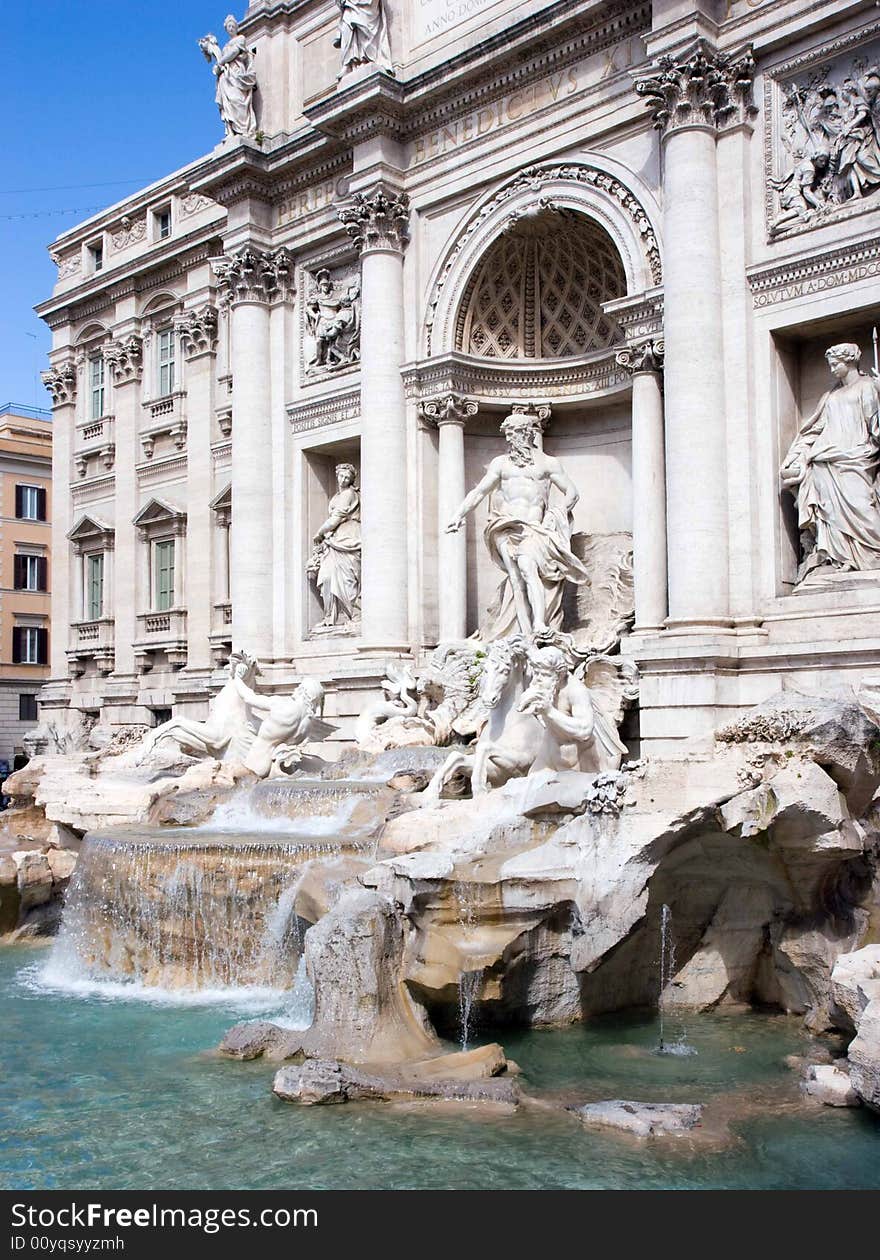 Trevi Fountain, Rome, Italy, with a blue sky background