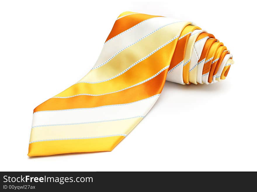 A rolled up necktie isolated on white background.