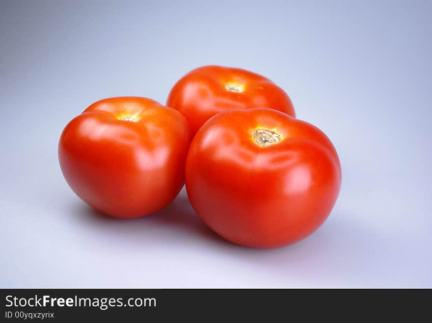 Three ready to serve raw tomatoes