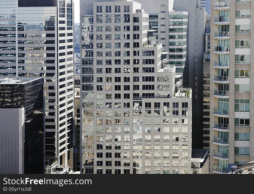 Tall Modern Urban Office Building In Sydney, Concrete And Glass Facade, Australia. Tall Modern Urban Office Building In Sydney, Concrete And Glass Facade, Australia