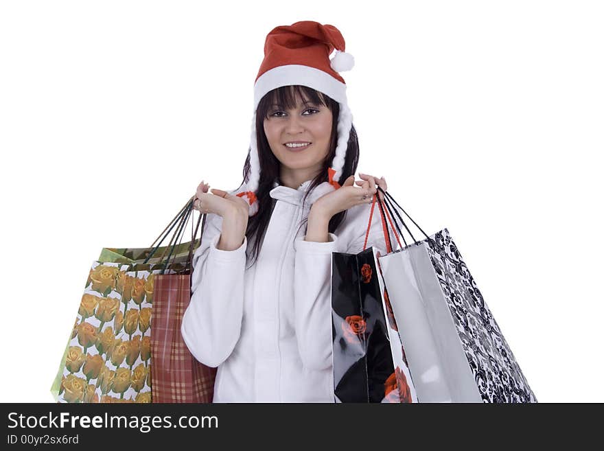 Woman with purchase on Christmas against a white background. Woman with purchase on Christmas against a white background