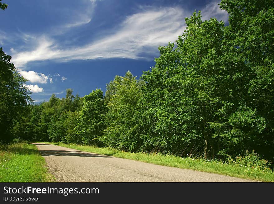 Road with blue sky above