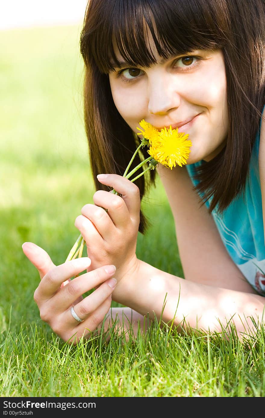 Girl with dandelions