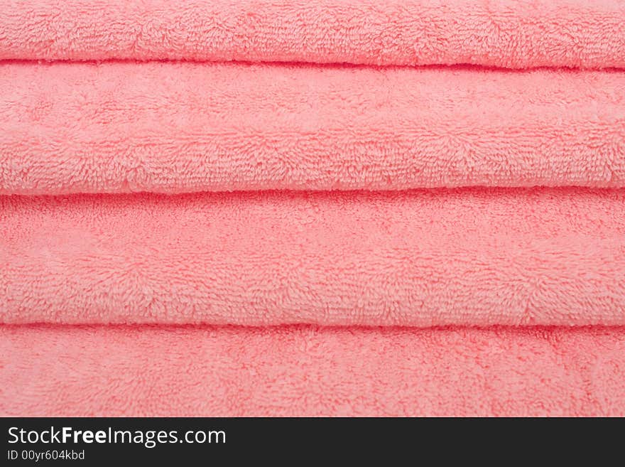 Pink cotton cloths stacked in many layers. Pink cotton cloths stacked in many layers.