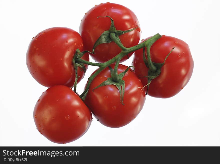 Tomatoes on a white background. Isolation. Tomatoes on a white background. Isolation