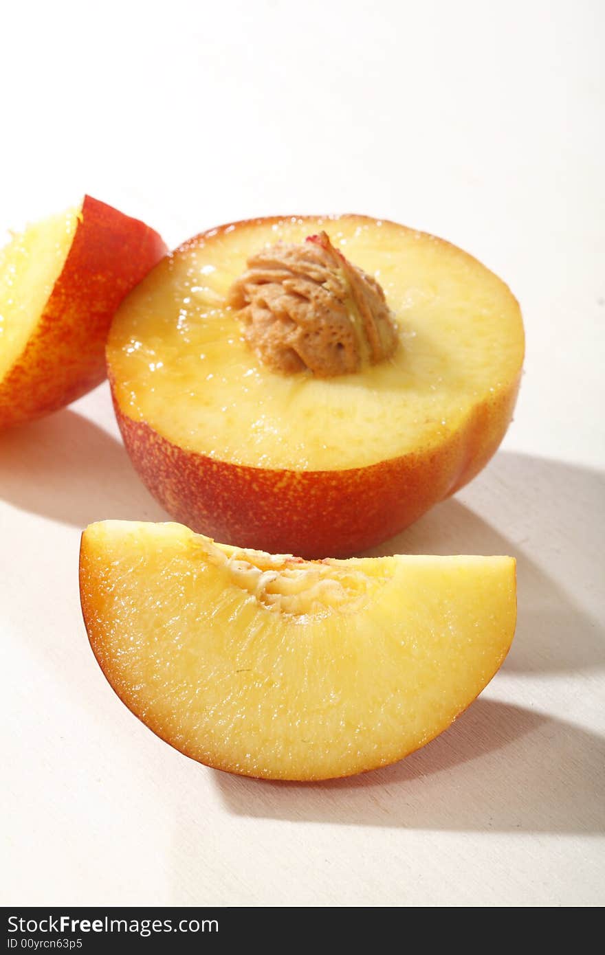 Nectarines on a white background