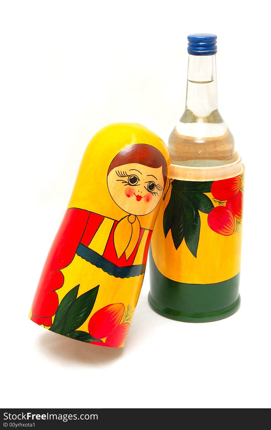 Matreshka and vodka on a white background