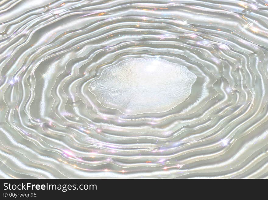 Pearled water ripples in sparkling water