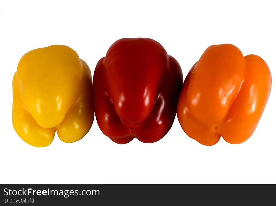 Sweet Bulgarian  peppers of three colors - yellow red and orange. Sweet Bulgarian  peppers of three colors - yellow red and orange