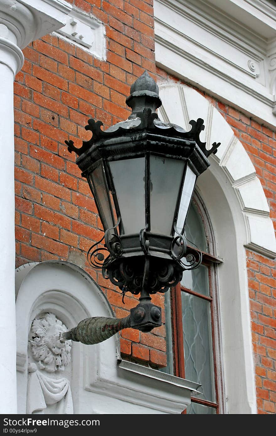 Detail of a wall with Lantern