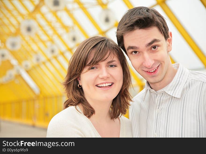 Young pair on footbridge