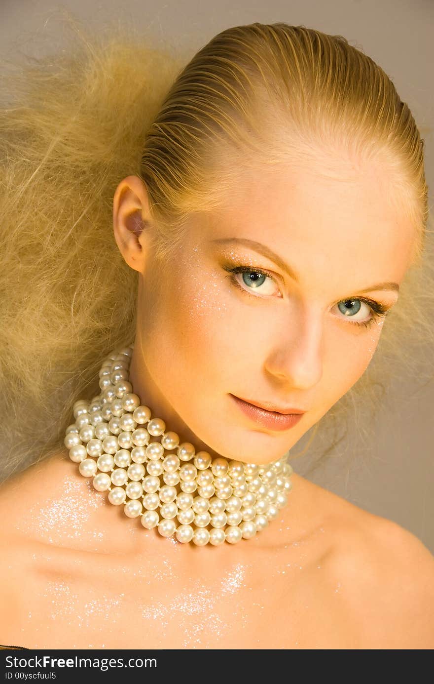 Beautiful girl in pearl necklace. Beautiful girl in pearl necklace