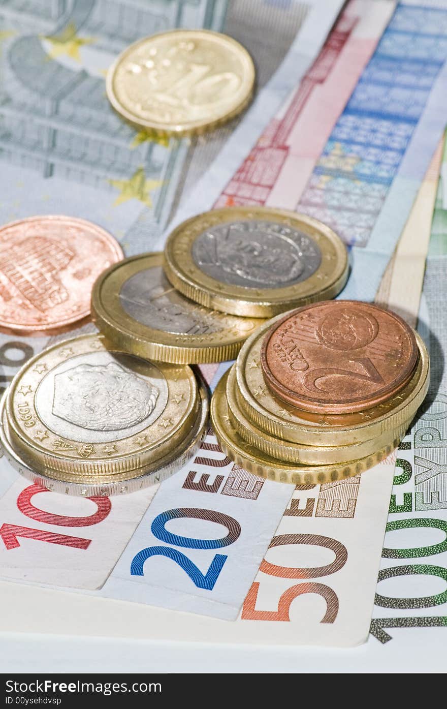 Close up euro banknotes and coins. Close up euro banknotes and coins