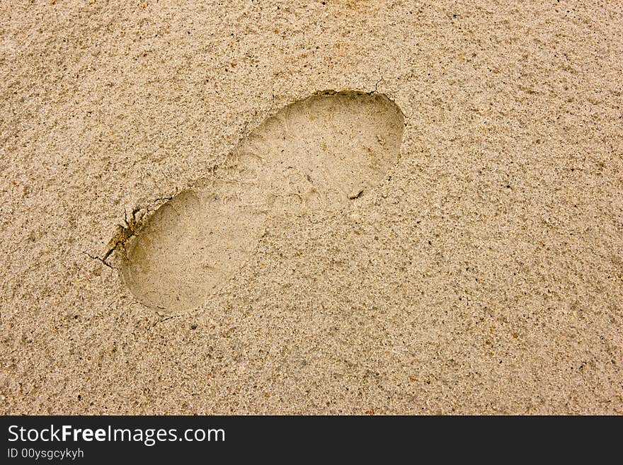 Footprints going over a sand