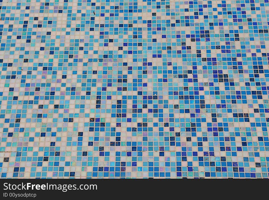 The mosaic ground of a swimming pool. The mosaic ground of a swimming pool.