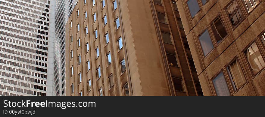 Windows on modern skyscraper buildings, panoramic photograph. Windows on modern skyscraper buildings, panoramic photograph.