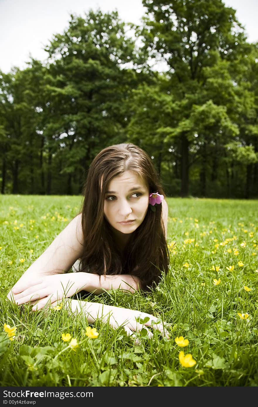 Woman Relaxing On The Meadow. Woman Relaxing On The Meadow