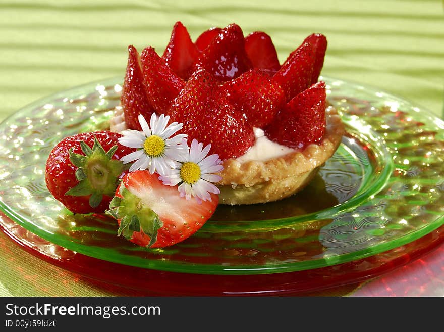 Strawberry cake with pudding on a plate