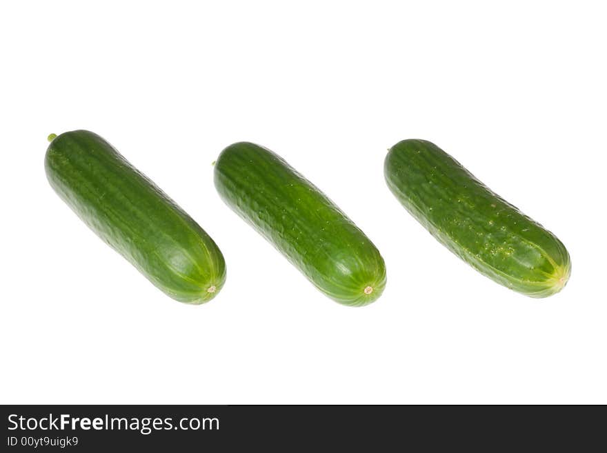 Three Cucumbers On White.