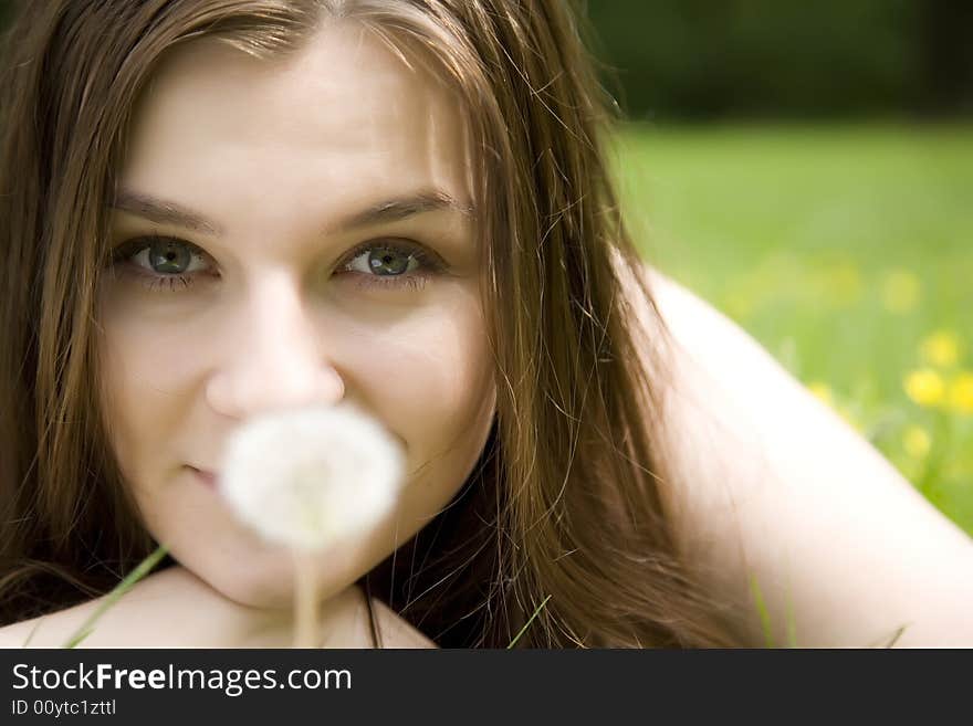 The Girl Looking On Dandelion