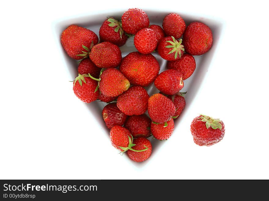 Bowl of strawberries on white.