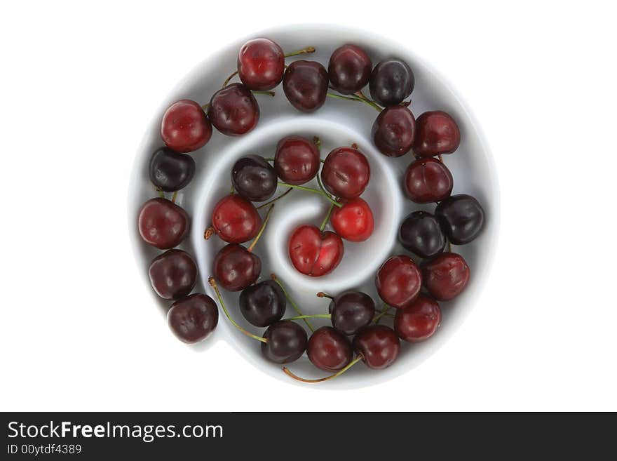 Bowl of cherries on white. Bowl of cherries on white.