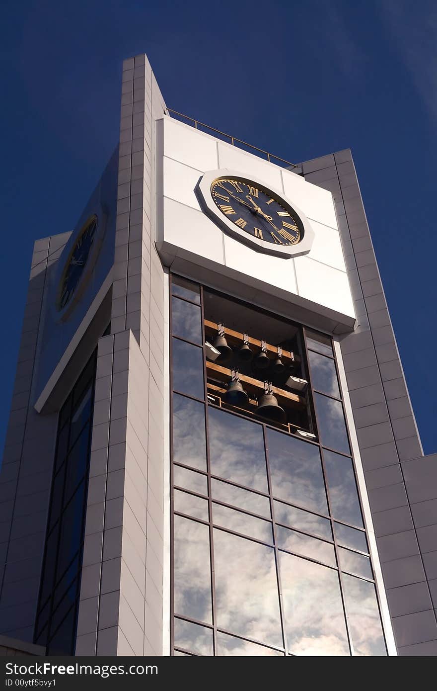 The modern town hall. A tower with a clock.