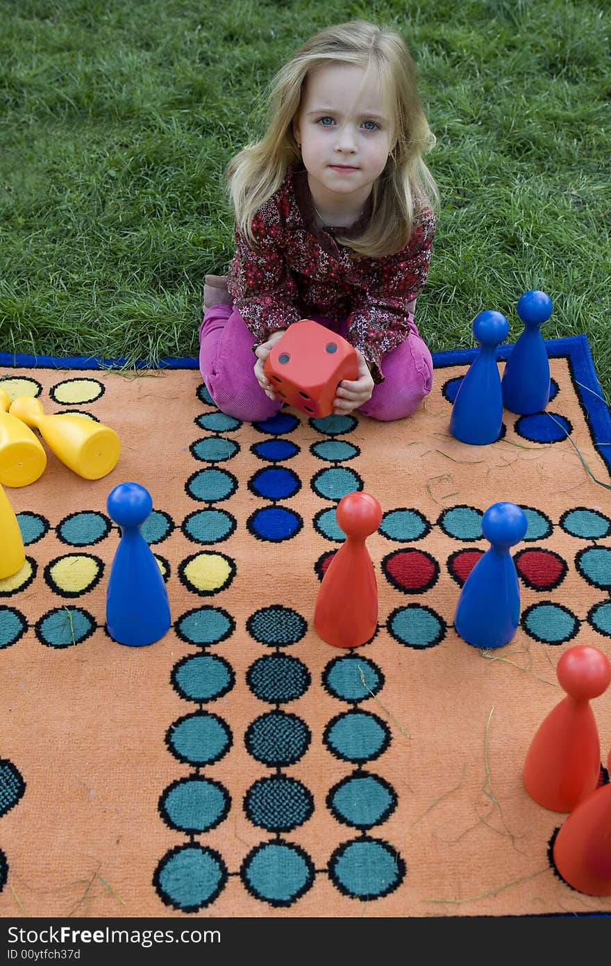 Child Playing With A Board