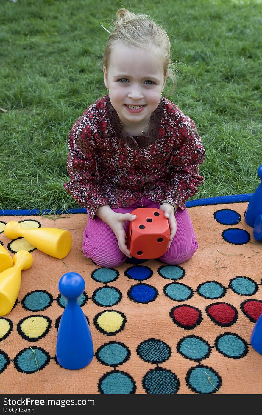 Child Playing With A Board