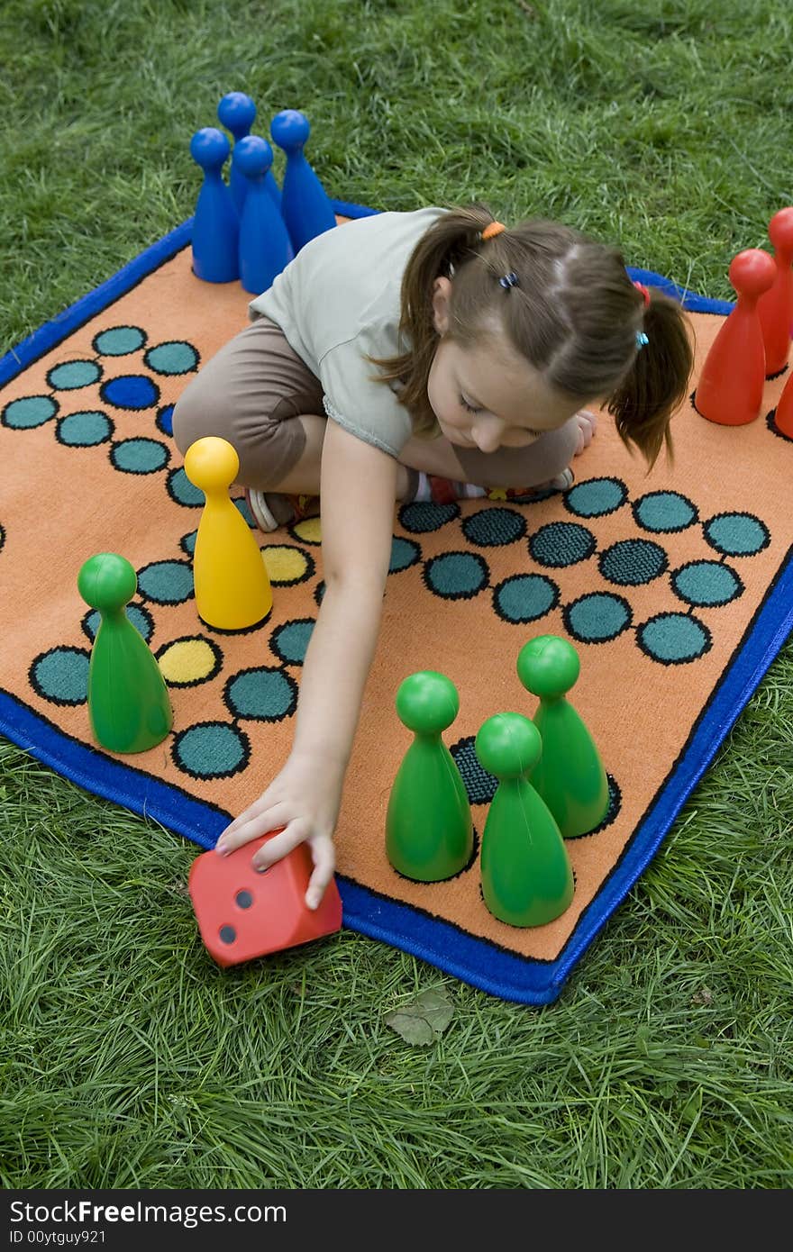 Child Playing With A Board